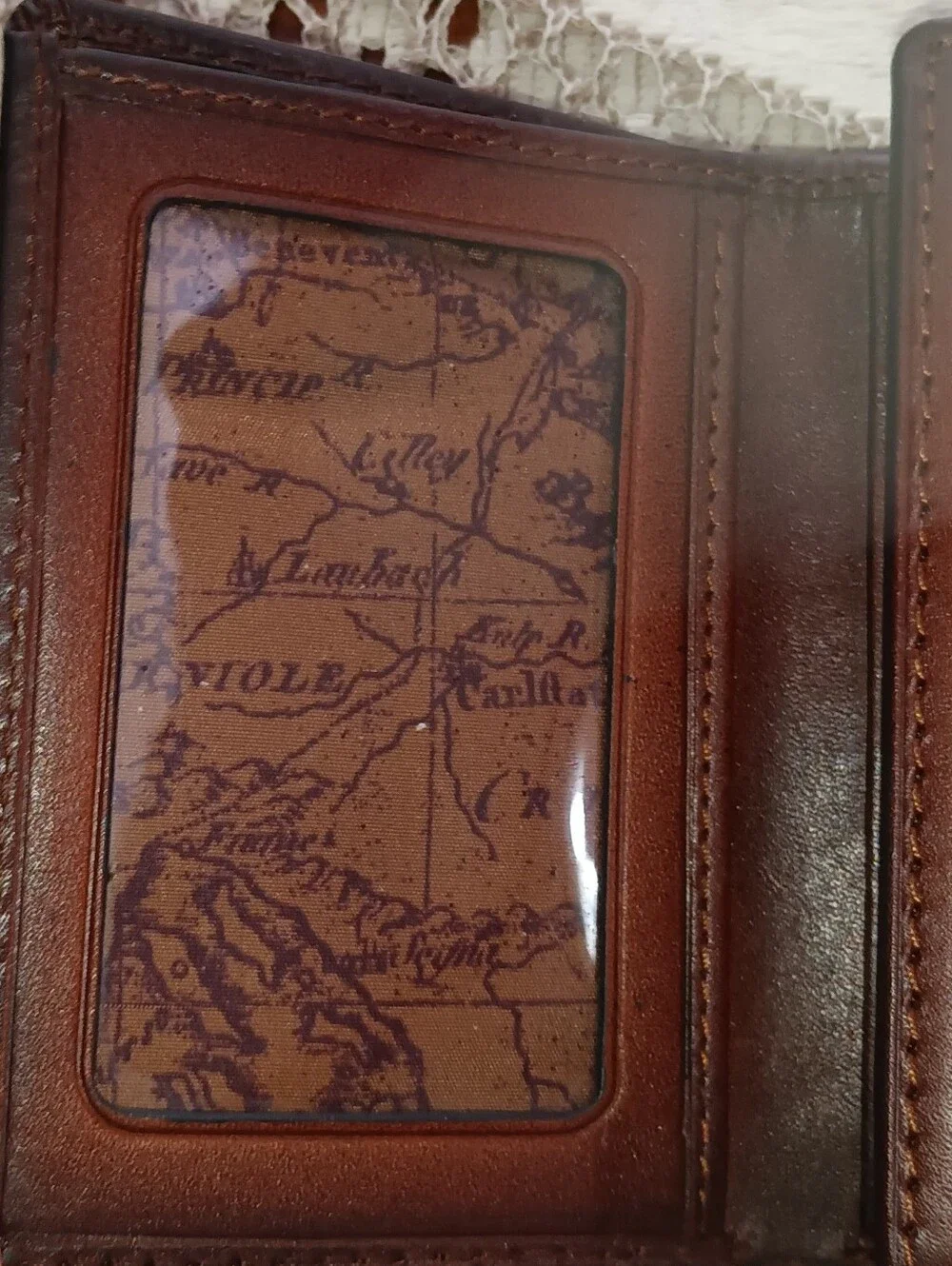Men's Brown Leather Bifold Wallet with Embossed Logo Nash.